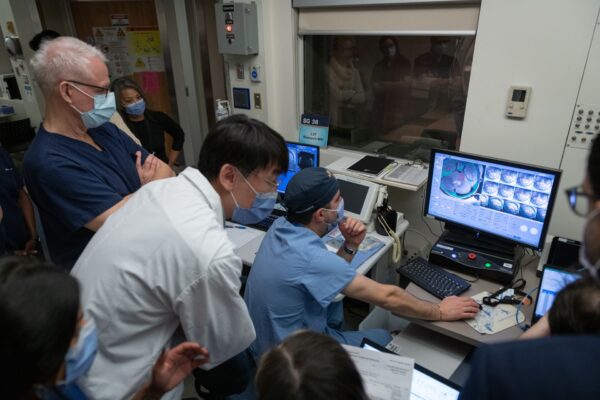 The team of researchers from Sunnybrook and SickKids monitor progress during treatment.