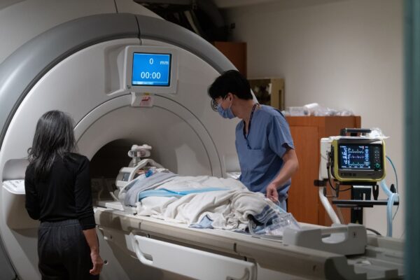 The patient is in the MRI during treatment.